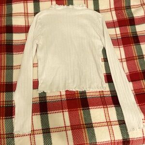 White turtleneck long-sleeved top